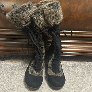 Black suede boot with wedge heel lace up